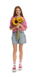 Photo of Teenage girl with bouquet of beautiful sunflowers on white background