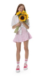 Photo of Teenage girl with bouquet of beautiful sunflowers on white background