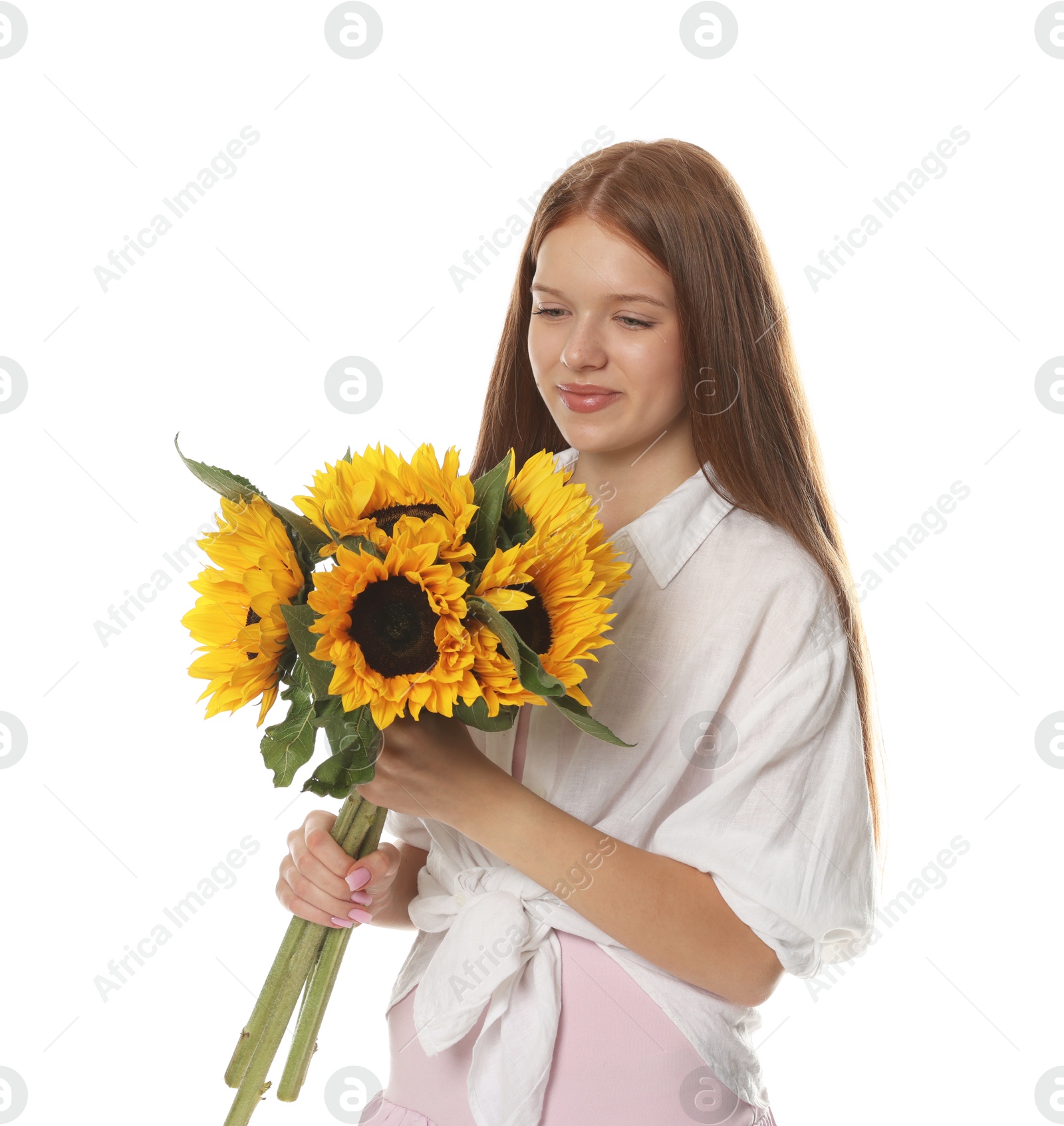 Photo of Teenage girl with bouquet of beautiful sunflowers on white background