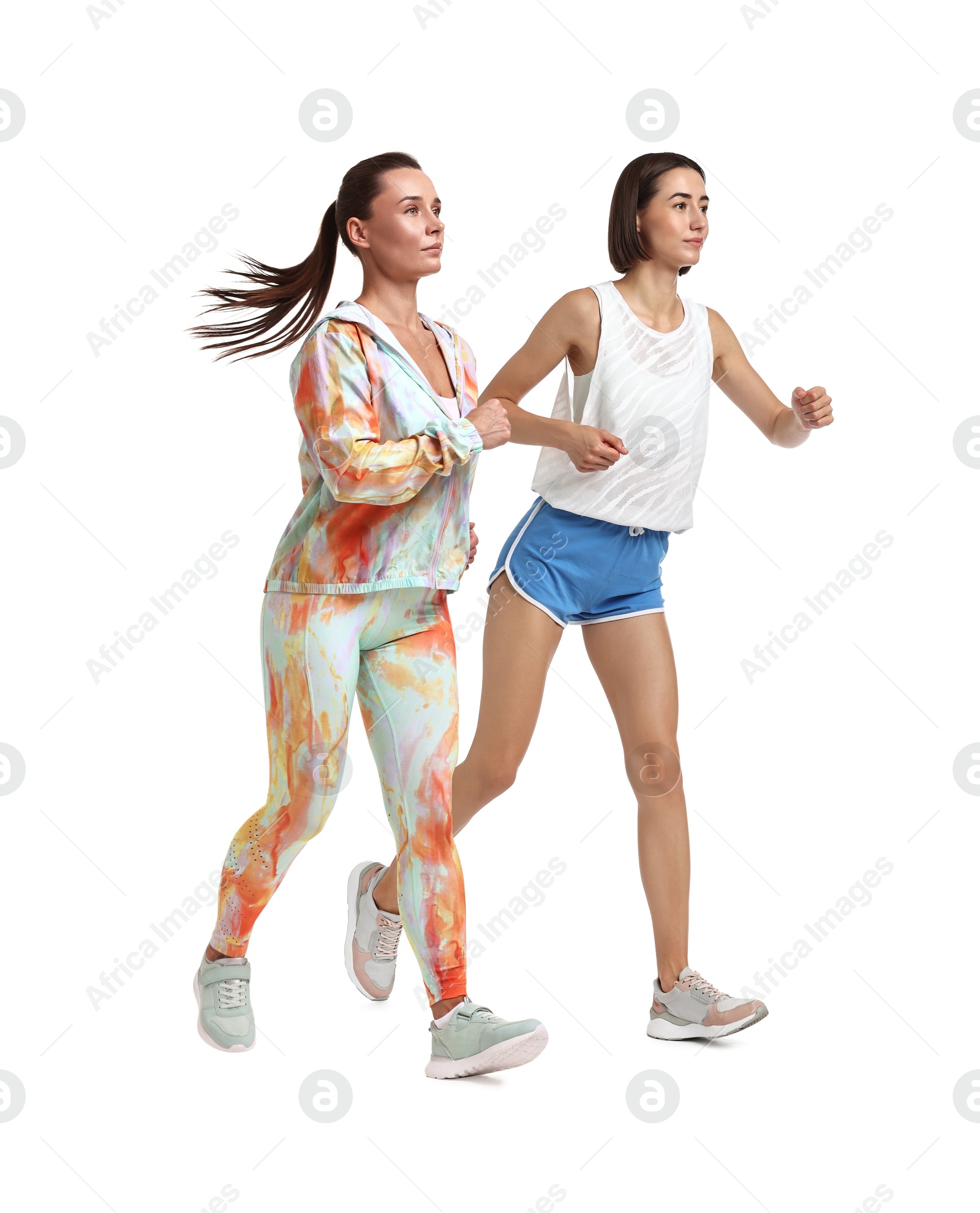 Image of Women in sportswear running on white background