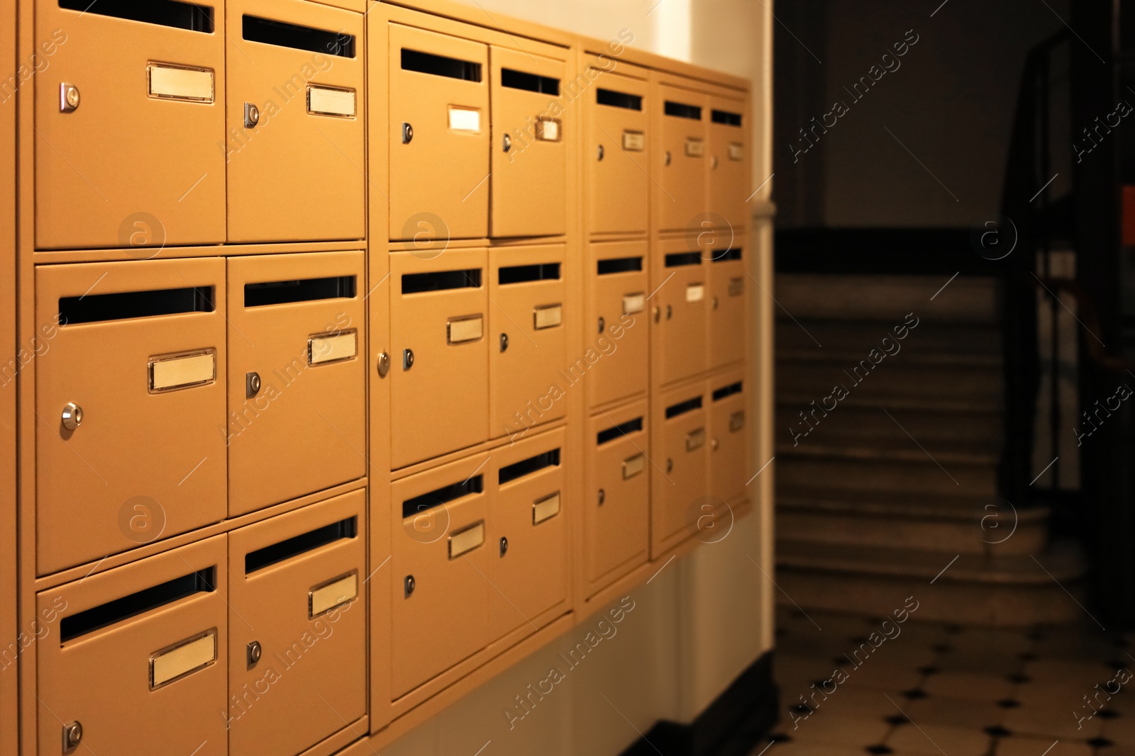 Photo of Many metal mailboxes with keyholes at post office