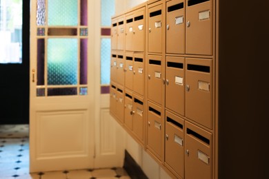 Photo of Many metal mailboxes with keyholes at post office