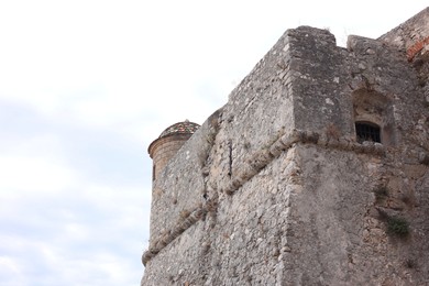 Photo of View of old building outdoors, low angle view. Space for text