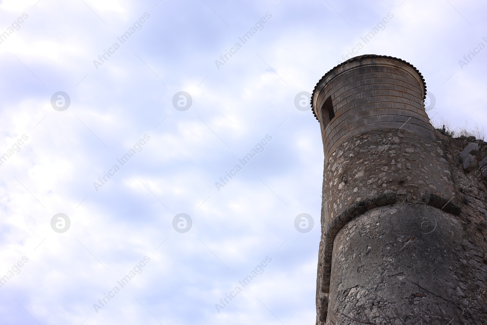 Photo of Picturesque view of beautiful old building against blue sky, low angle view. Space for text