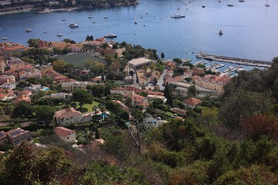 Photo of Picturesque view of city, sea and boats