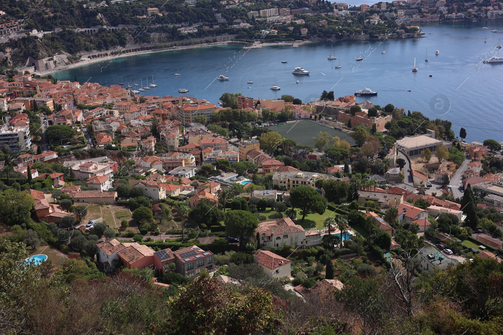 Photo of Picturesque view of city, sea and boats