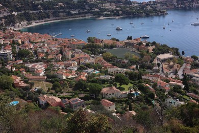 Photo of Picturesque view of city, sea and boats