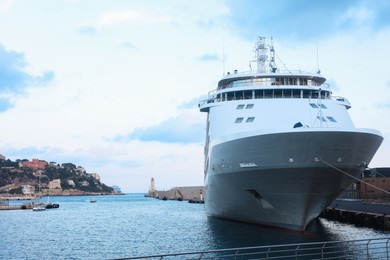 Photo of View of ferry moored in sea port at summer, space for text