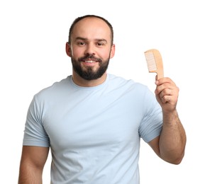 Photo of Baldness problem. Smiling man with comb on white background