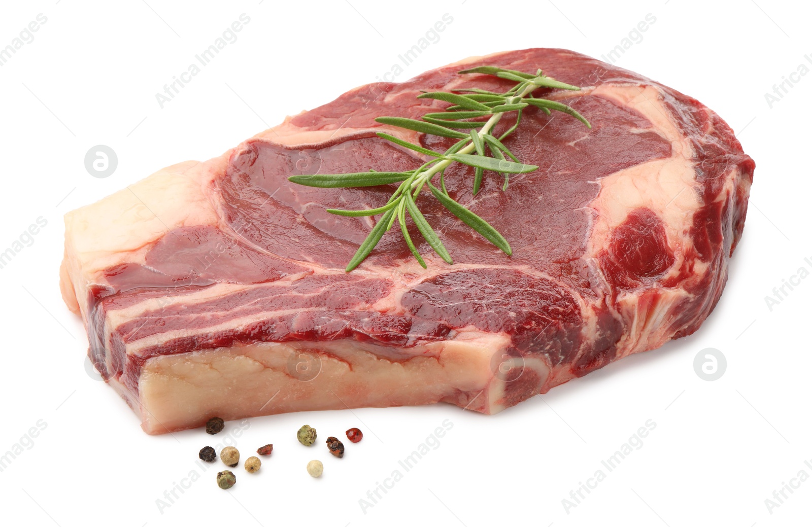 Photo of Piece of raw beef meat and spices isolated on white