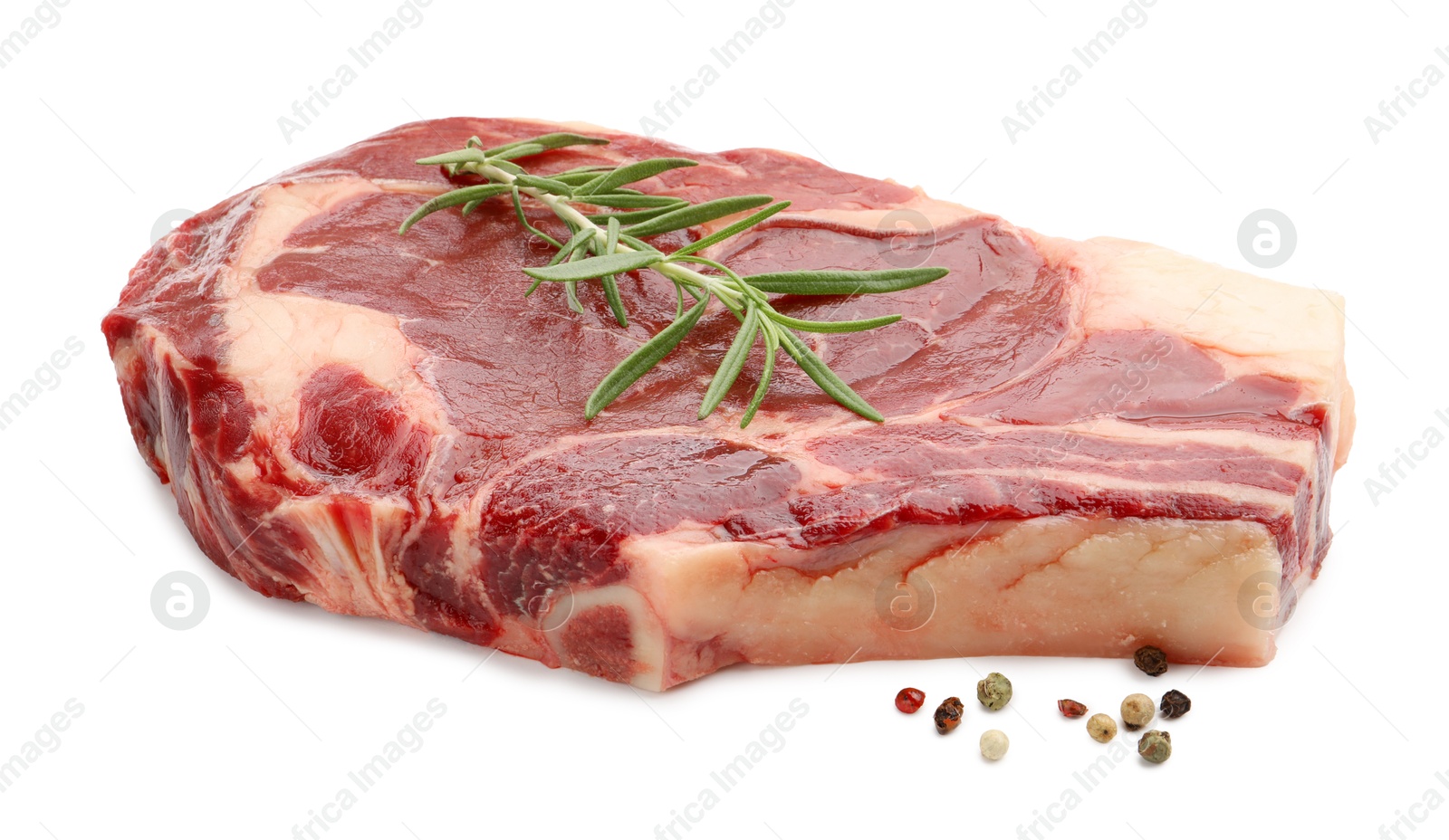 Photo of Piece of raw beef meat and spices isolated on white