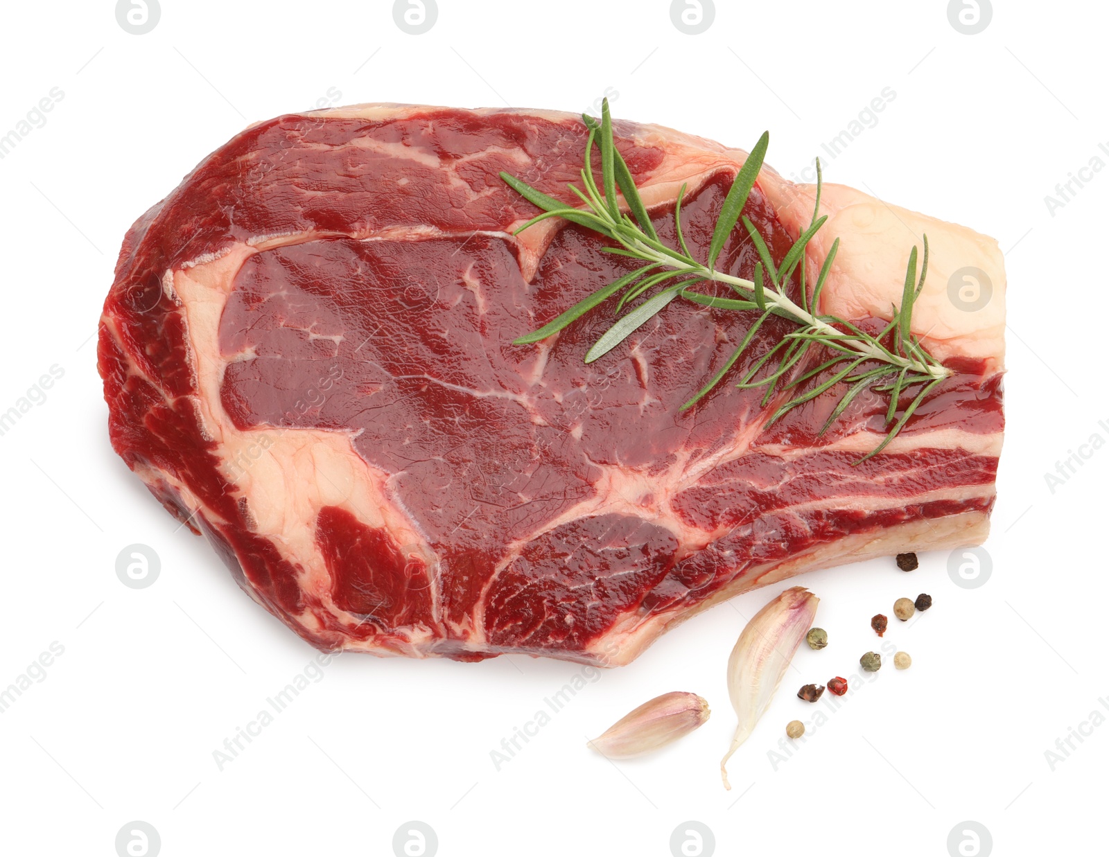 Photo of Piece of raw beef meat and spices isolated on white, top view
