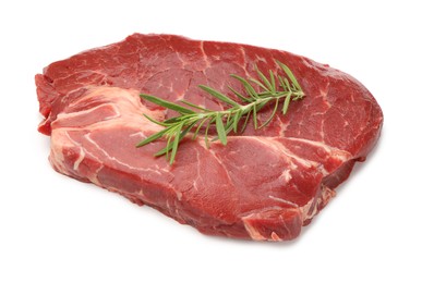 Photo of Piece of raw beef meat and rosemary isolated on white