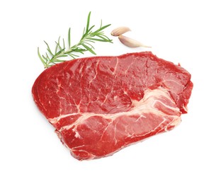 Photo of Piece of raw beef meat and spices isolated on white, top view