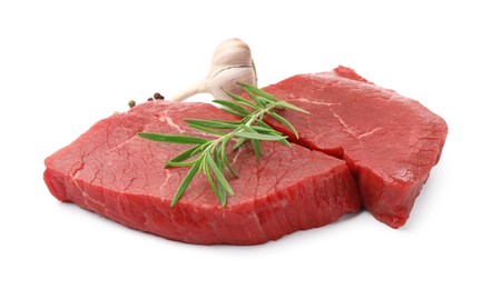 Photo of Pieces of raw beef meat and spices isolated on white