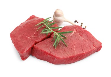 Photo of Pieces of raw beef meat and spices isolated on white
