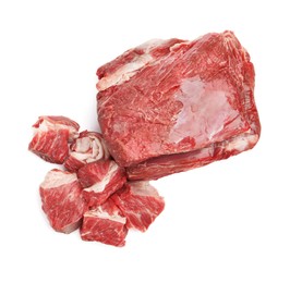 Photo of Pieces of raw beef meat isolated on white, top view
