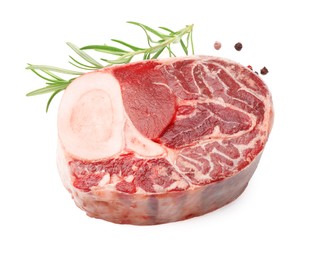 Photo of Piece of raw beef meat and spices isolated on white