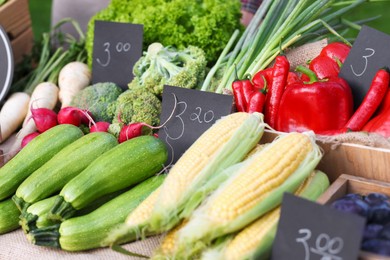 Photo of Many different vegetables on stall at farmer's market, closeup
