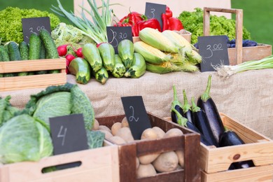 Photo of Many different vegetables on stall at farmer's market, closeup
