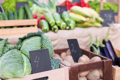 Photo of Many different vegetables on stall at farmer's market, closeup