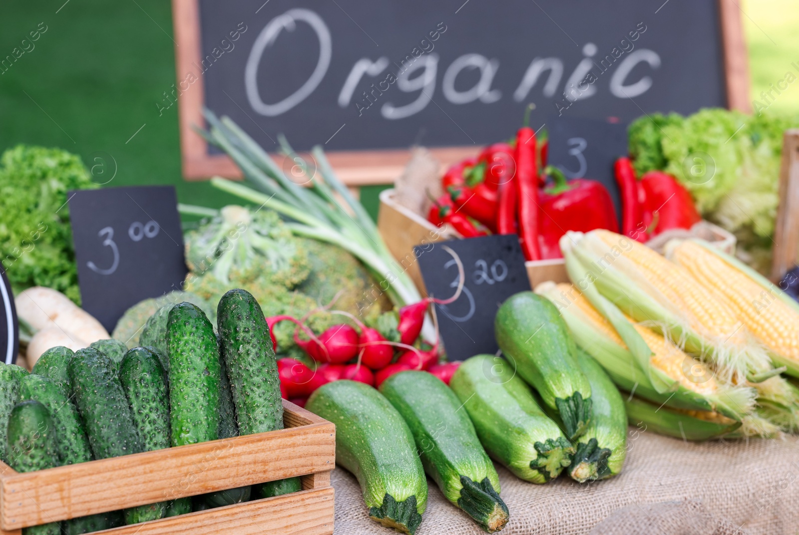Photo of Many different vegetables on stall at farmer's market, closeup