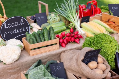 Photo of Many different vegetables on stall at farmer's market, closeup