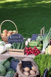Photo of Many different vegetables on stall at farmer's market, closeup