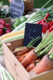Photo of Many different vegetables on stall at farmer's market, closeup