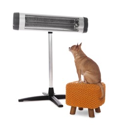 Photo of Cute little dog on pouf near electric heater against white background