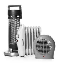 Photo of Different modern electric heaters isolated on white