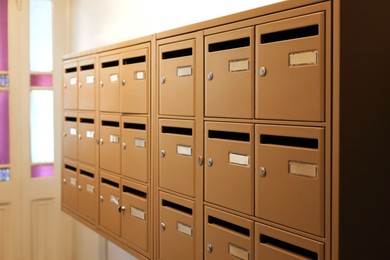 Photo of Many metal mailboxes with keyholes at post office