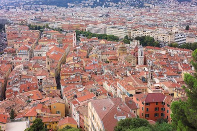 Photo of Cityscape with beautiful buildings and green trees