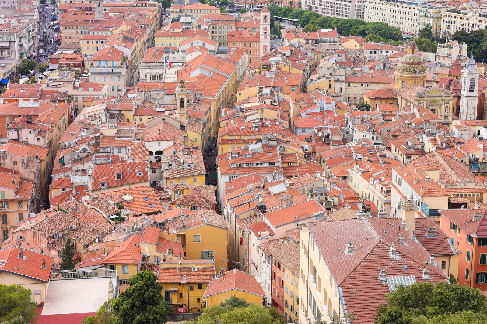 Photo of Cityscape with beautiful buildings and green trees