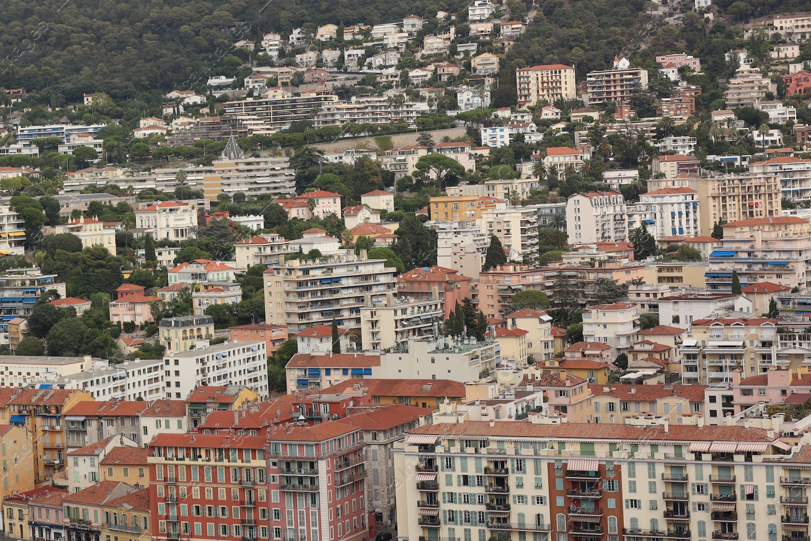 Photo of Nice, France - August 24, 2025: Picturesque view of city with beautiful buildings and green trees