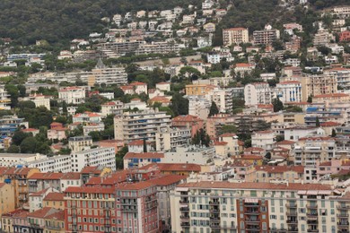 Photo of Nice, France - August 24, 2025: Picturesque view of city with beautiful buildings and green trees