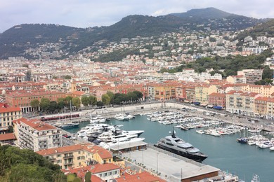 Photo of Nice, France - August 24, 2025: Picturesque view of moored boats in harbor near city