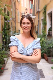 Photo of Portrait of beautiful woman on city street