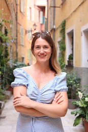 Photo of Portrait of beautiful woman on city street
