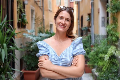 Photo of Portrait of beautiful woman on city street