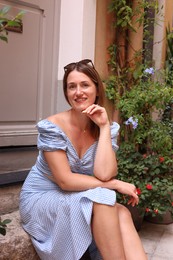 Photo of Portrait of beautiful woman on city street