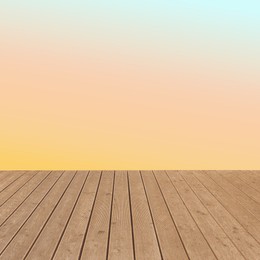 Image of Empty wooden floor and color gradient wall. Space for design