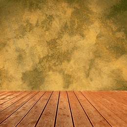 Image of Empty wooden floor and color textured wall. Space for design