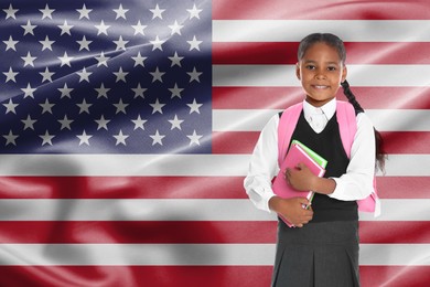 Image of Little girl with backpack and notebooks against flag of USA. Language school