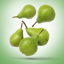 Image of Fresh green pears flying in air on color background