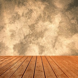 Image of Empty wooden floor and beige grey textured wall. Space for design