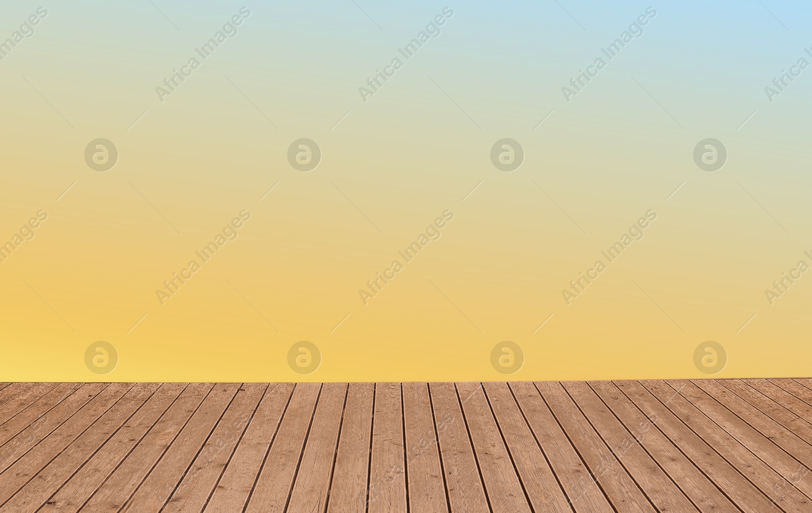 Image of Empty wooden floor and color gradient wall. Space for design