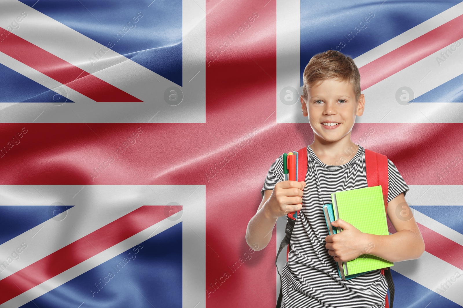 Image of Little boy with backpack and stationery against flag of United Kingrom. Language school