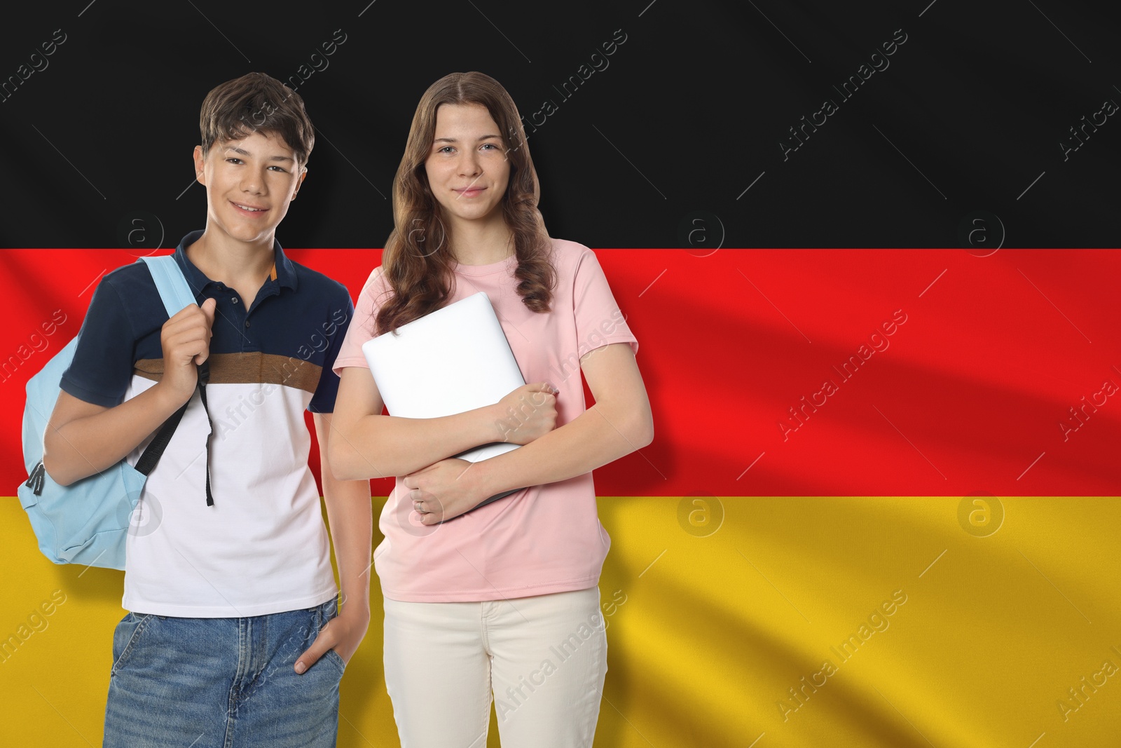 Image of Students against flag of Germany. Language school