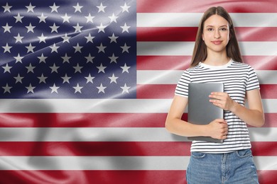 Image of Student with laptop against flag of USA. Language school